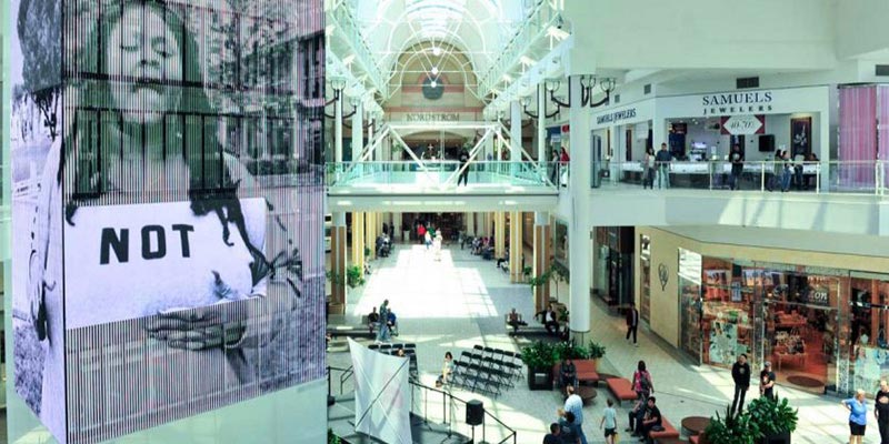 Interior of a mall that has an LED video installation.